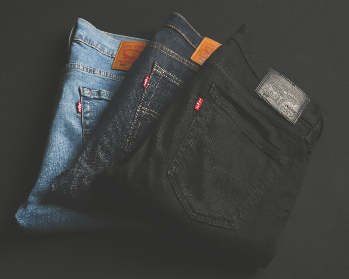 Denim jeans showing different shades, stitching and pocket construction